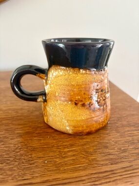 Handcrafted Laurentian Pottery Two-Tone Ceramic Mug in Black and Golden Brown